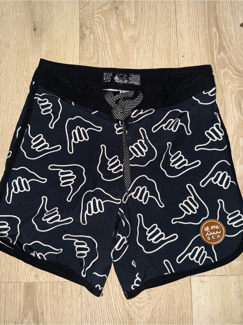 Kids Black Graphic Swim Trunks with Shaka Print
